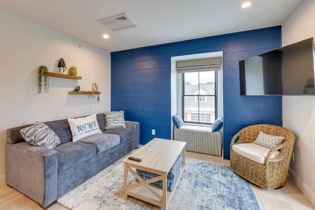 a living room with a couch and a table at Provincetown Vacation Rental Pet Friendly! in Provincetown