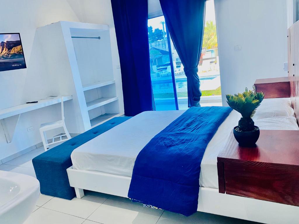 Postel nebo postele na pokoji v ubytování Apart Hotel Paredes