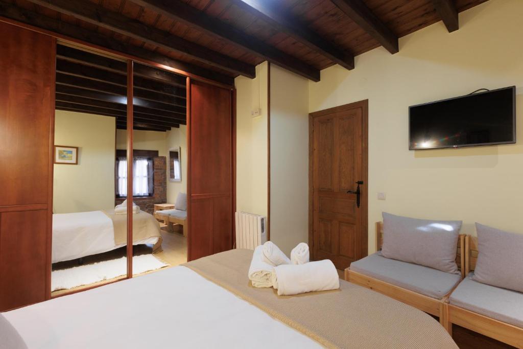 Cama o camas de una habitación en Hotel Rural El Molino