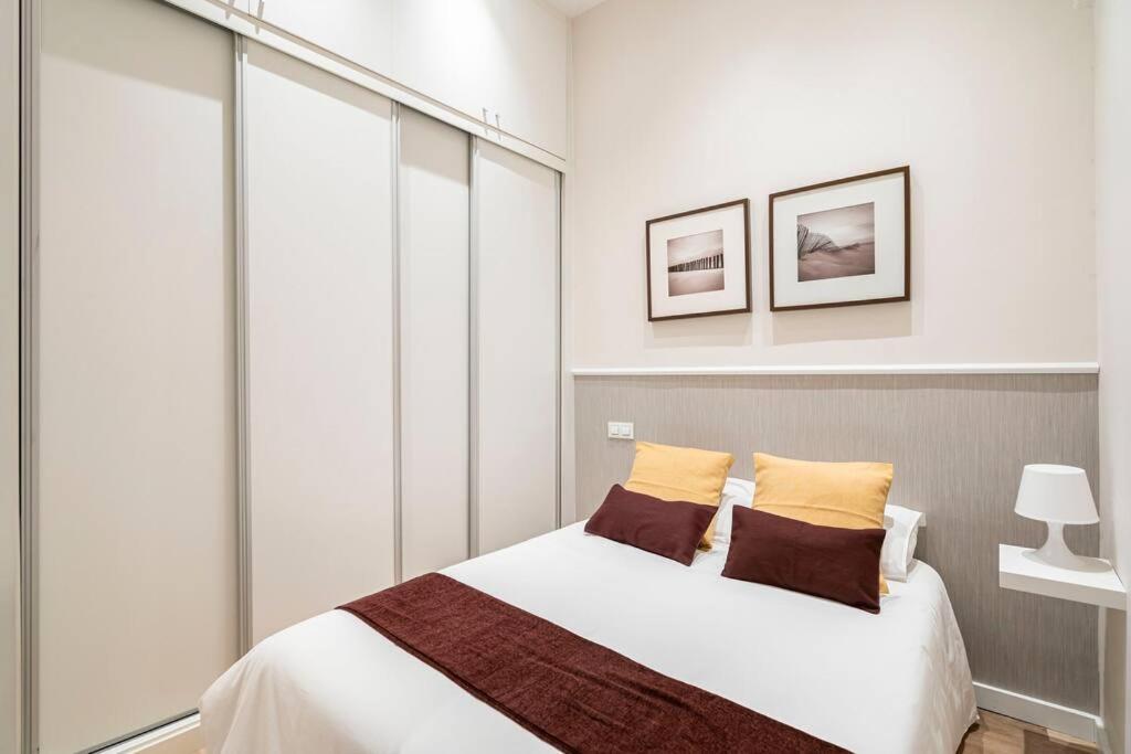 Postel nebo postele na pokoji v ubytování Victor Apartments Prado