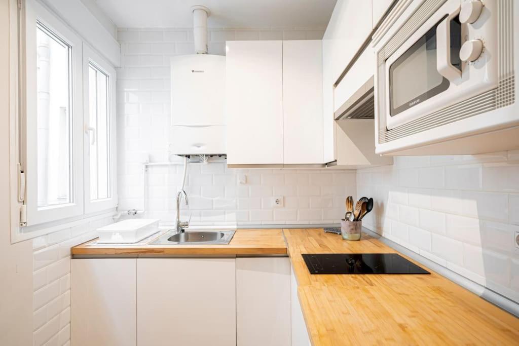 Kuchyň nebo kuchyňský kout v ubytování Victor Apartments Prado