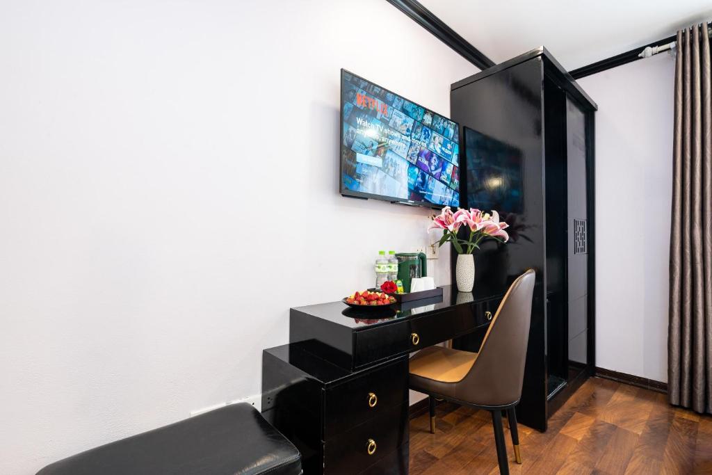 TV a/nebo společenská místnost v ubytování Hanoi Memory Premier Hotel & Spa