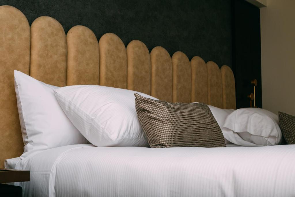Postel nebo postele na pokoji v ubytování Hotel HW High Wellness