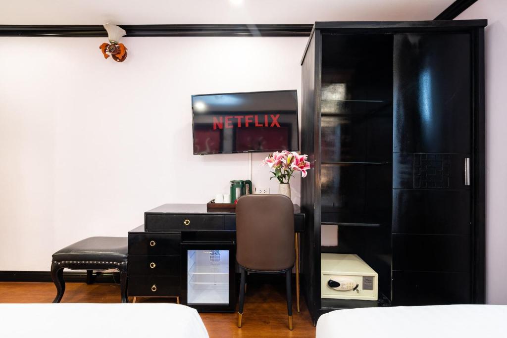 TV a/nebo společenská místnost v ubytování Hanoi Memory Premier Hotel & Spa
