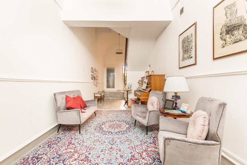Posezení v ubytování Dimora Le Tre Muse Guesthouse