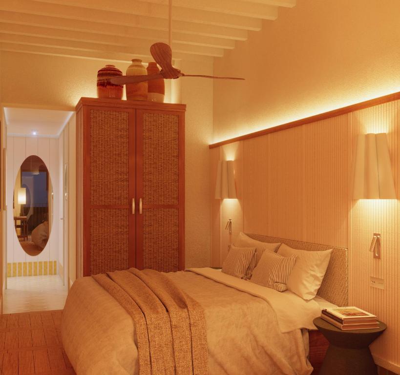 Postel nebo postele na pokoji v ubytování Casa Bassa Hotel