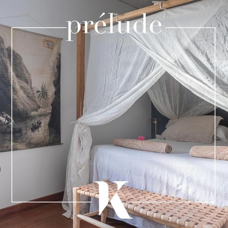 Postel nebo postele na pokoji v ubytování La Kazaka Terre Sainte