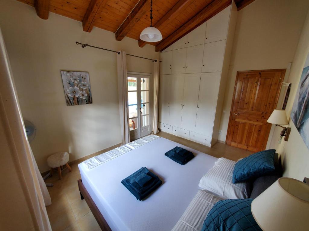 Postel nebo postele na pokoji v ubytování Villa Stefania