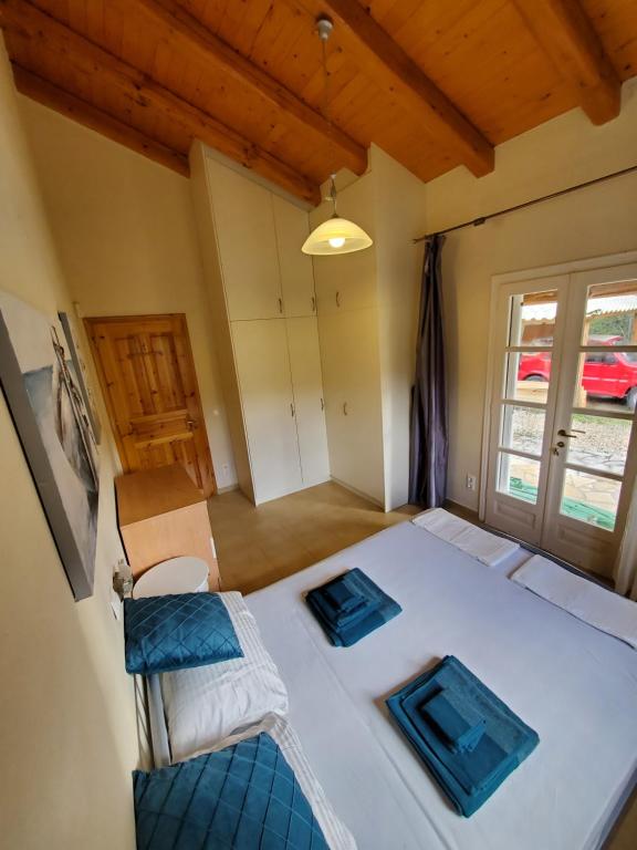 Postel nebo postele na pokoji v ubytování Villa Stefania