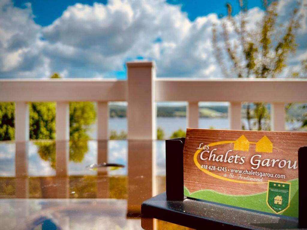 a box of cholas garma sits on a fence at Chalets Garou in St-Ferdinand