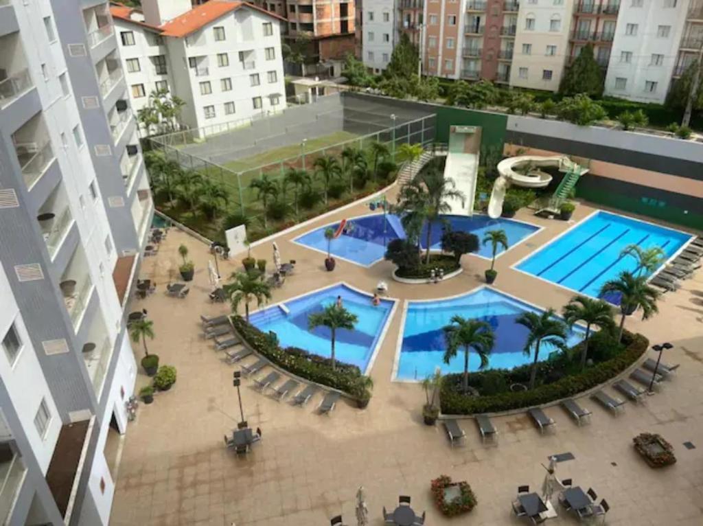 an overhead view of a pool in a building at Flat 123 - Veredas - 300 metros Hot Park - Vista Piscina in Rio Quente