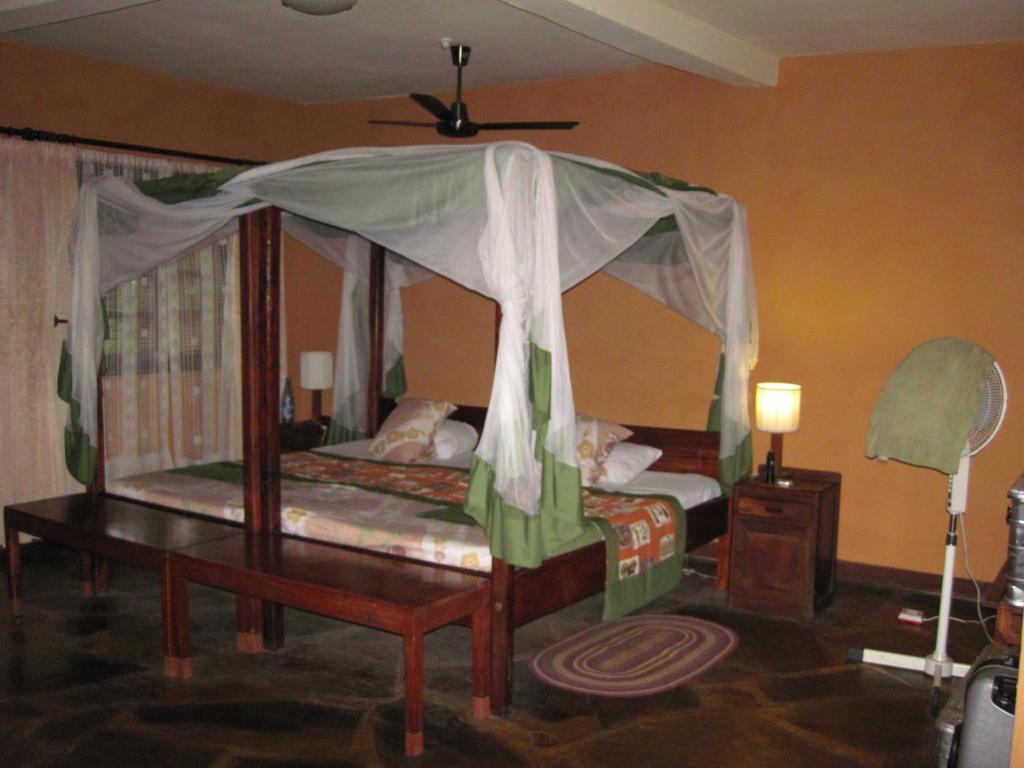 Postel nebo postele na pokoji v ubytování Boko Boko Guesthouse and Hotel