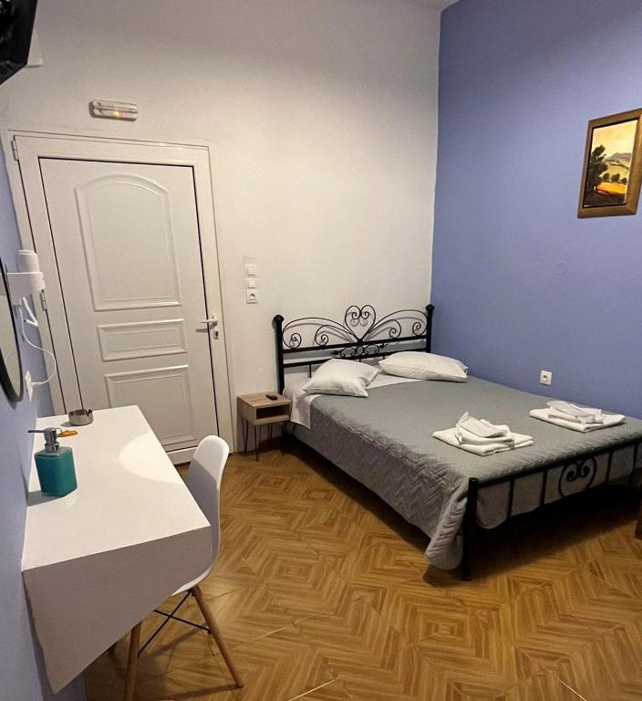 Uma cama ou camas num quarto em Stella Nomikou Apartments