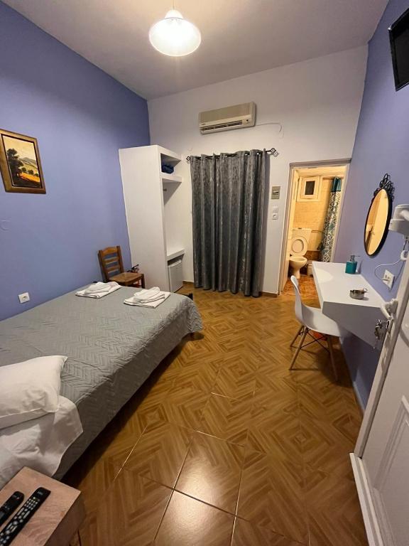 Uma cama ou camas num quarto em Stella Nomikou Apartments