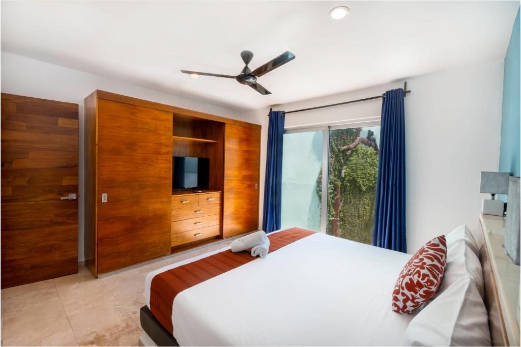 Postel nebo postele na pokoji v ubytování Hotel Playa Encantada