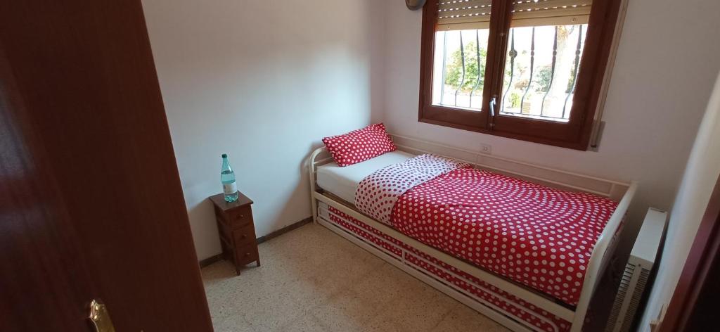 Posteľ alebo postele v izbe v ubytovaní Gira-sol villa