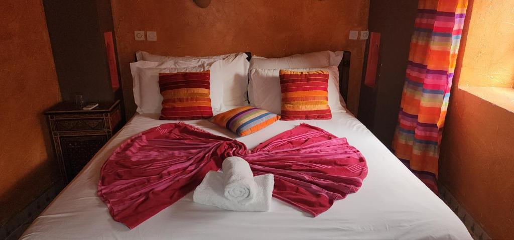 Postel nebo postele na pokoji v ubytování Kasbah Imlil