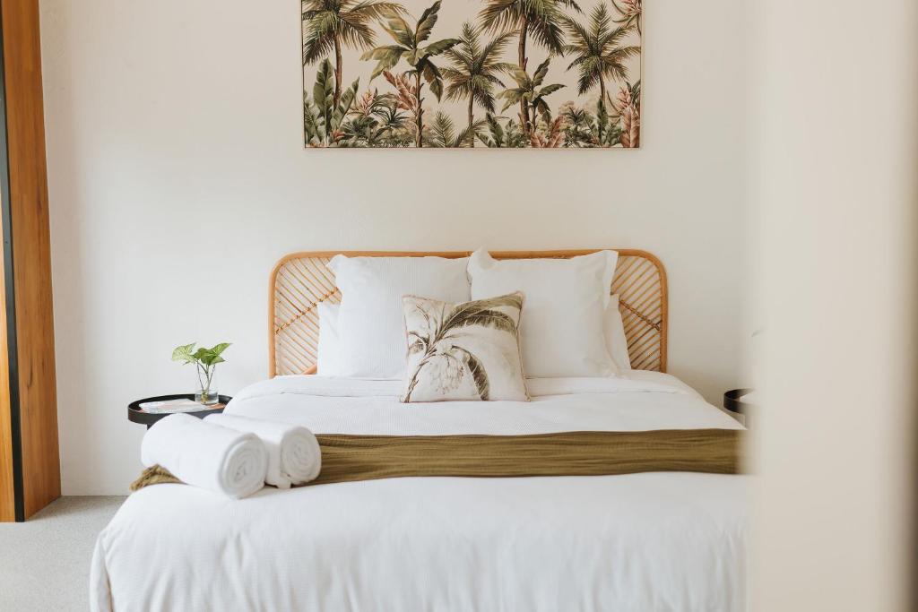 Säng eller sängar i ett rum på Tinarra Treetops