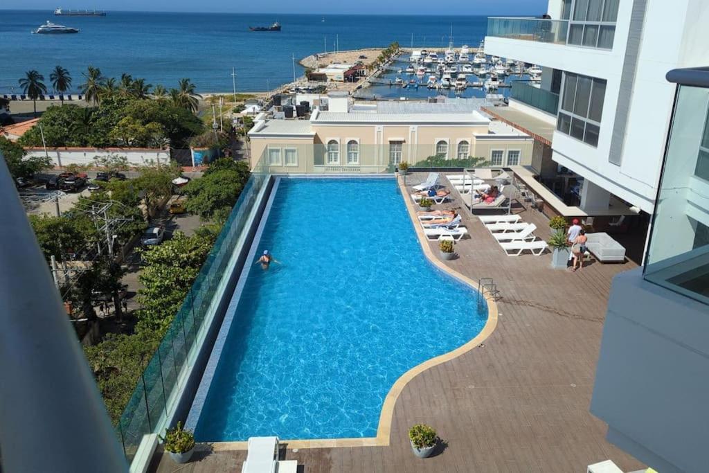 an overhead view of a swimming pool at a resort at Luxuriöses Appartement mit Pool in Gaira