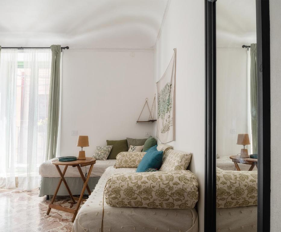 A bed or beds in a room at A Calata