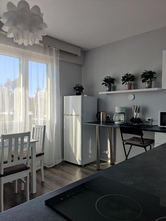 Kuchyň nebo kuchyňský kout v ubytování Sweet family apartments Hamina