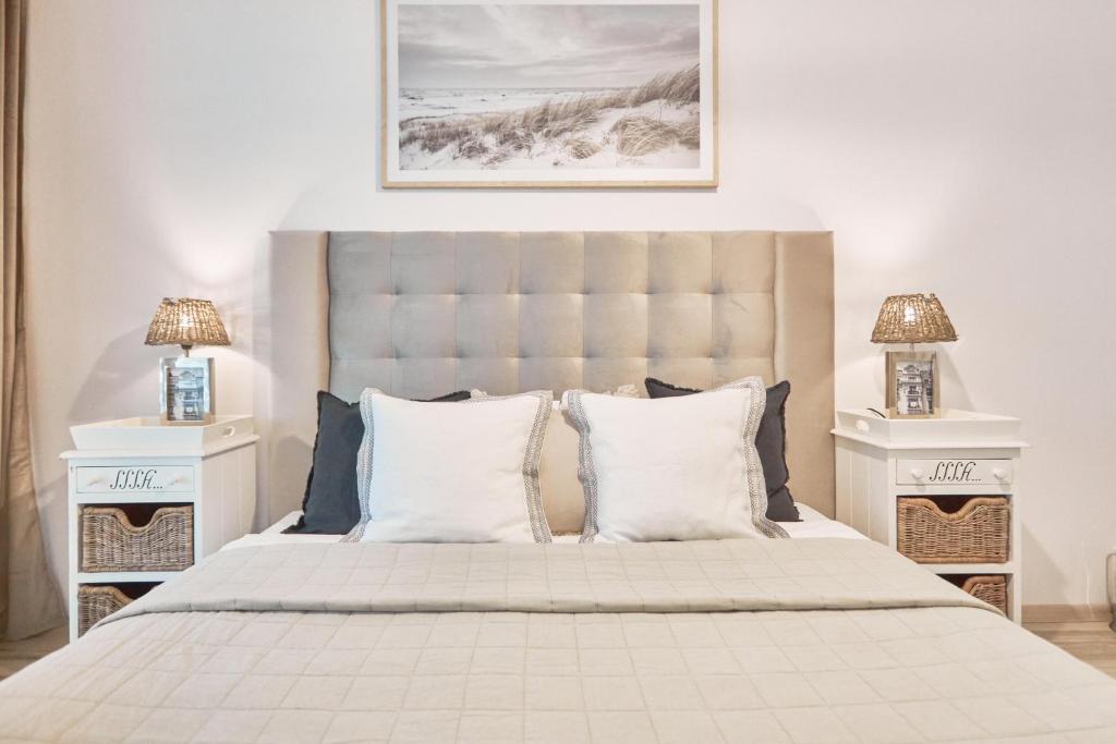 Posteľ alebo postele v izbe v ubytovaní Apartament Riviera z tarasem - Playa Baltis