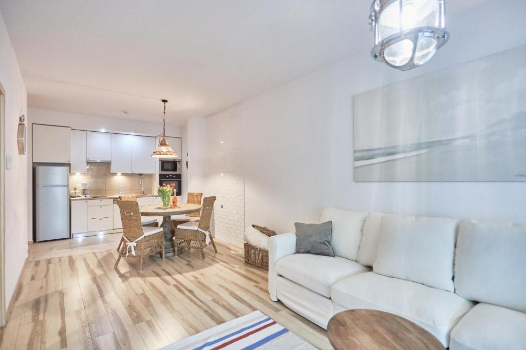 Posedenie v ubytovaní Apartament Riviera z tarasem - Playa Baltis