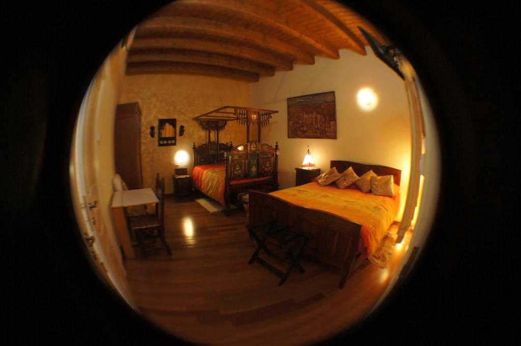 A bed or beds in a room at Bed and Breakfast Angolo Fiorito