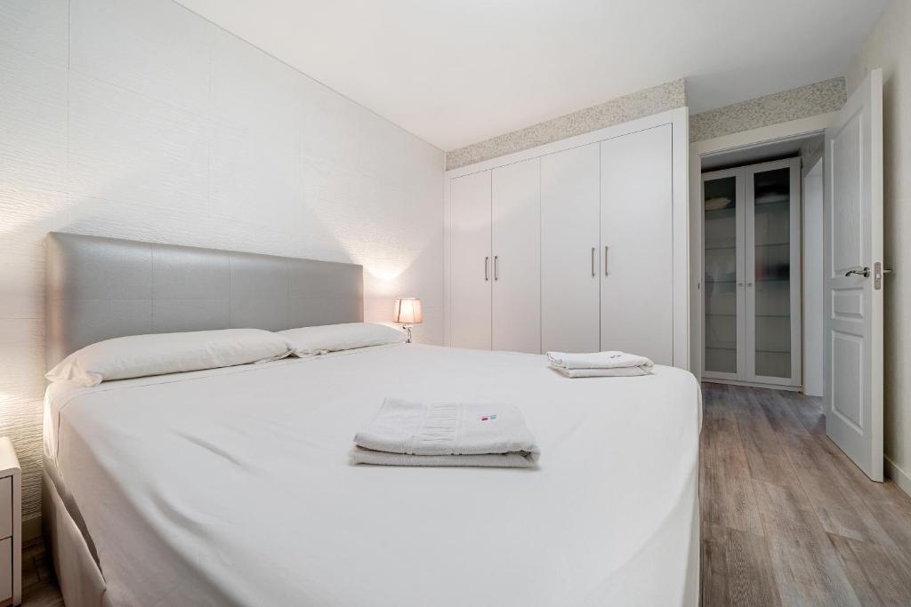 Postel nebo postele na pokoji v ubytování Hauzify I Apartament Kempenland