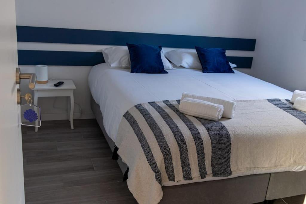 Krevet ili kreveti u jedinici u okviru objekta Perto do Mar, Alojamento Local - Espaço T2 privativo