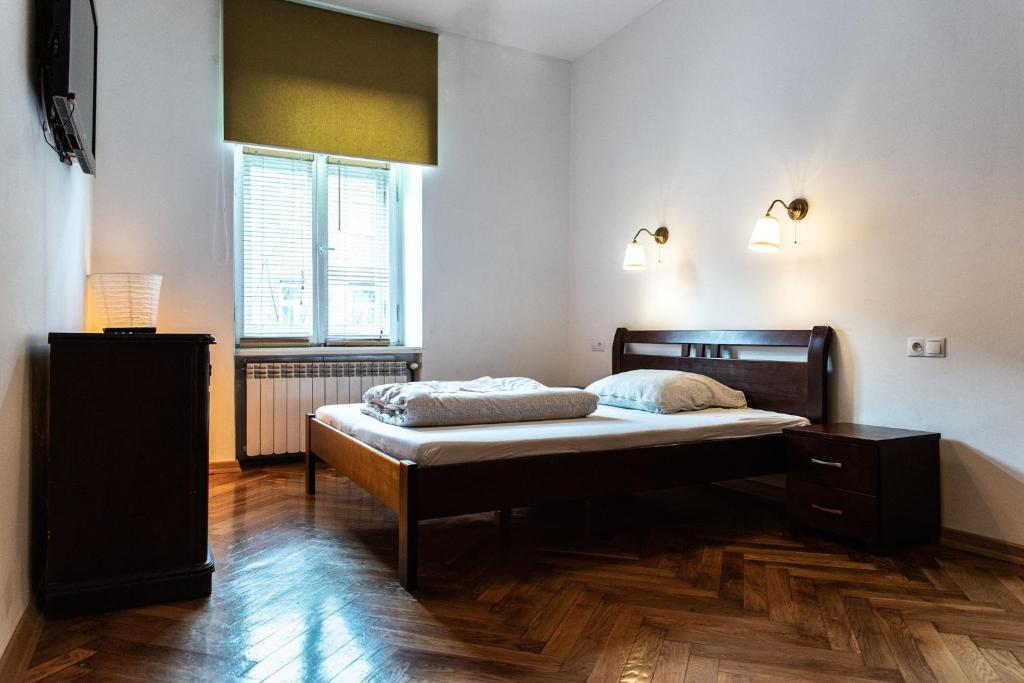 Postel nebo postele na pokoji v ubytování Apartament Cafe Belg