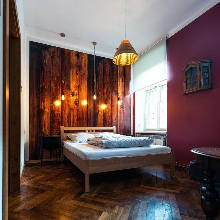 Postel nebo postele na pokoji v ubytování Apartament Cafe Belg