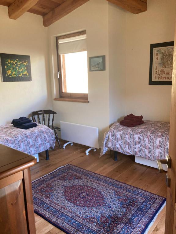 Voodi või voodid majutusasutuse Chalet Gorret toas