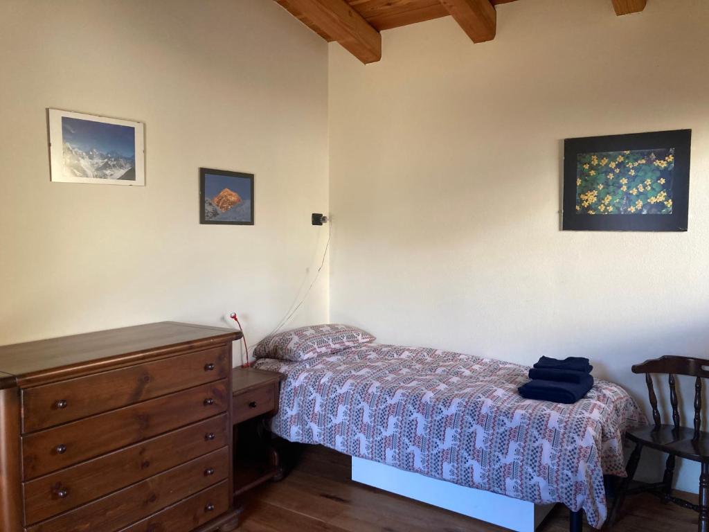 Voodi või voodid majutusasutuse Chalet Gorret toas
