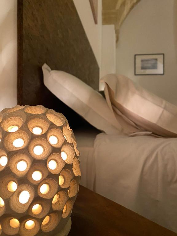 Un ou plusieurs lits dans un hébergement de l'établissement Miro B&B