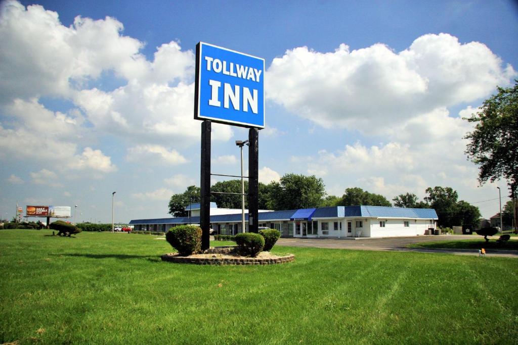 Et logo, certifikat, skilt eller en pris der bliver vist frem på Tollway Inn Beloit
