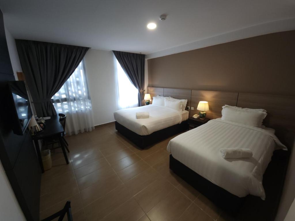 Postel nebo postele na pokoji v ubytování Yu Hotel Chinatown