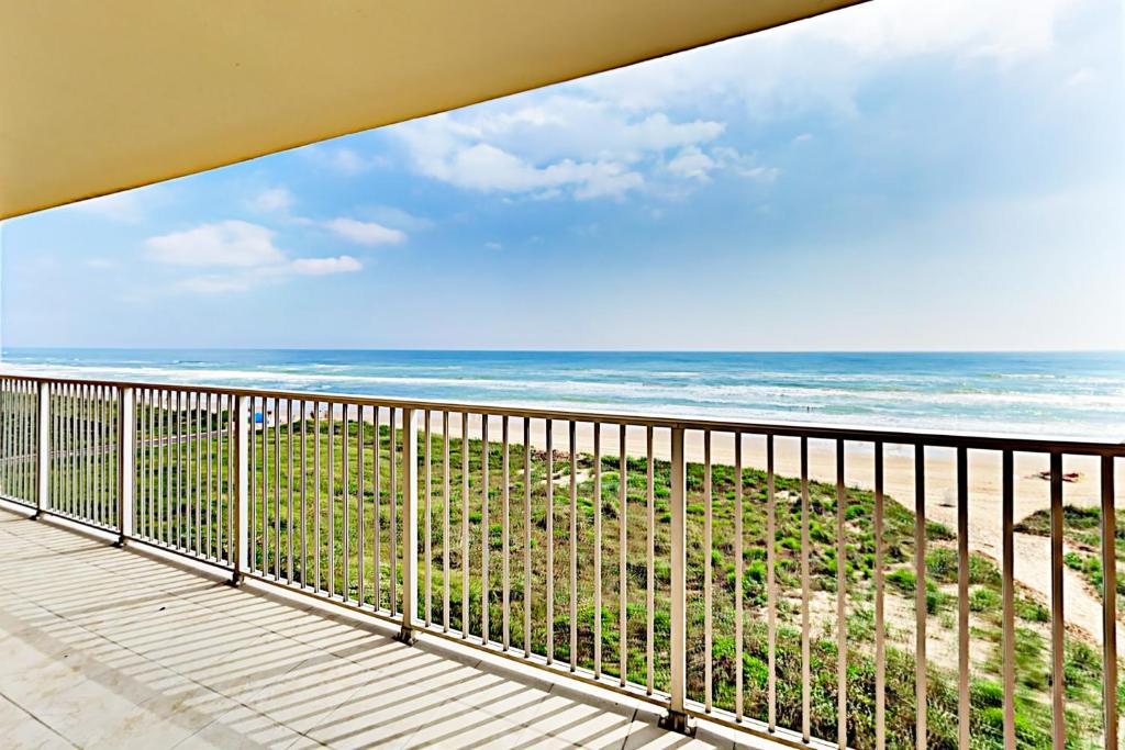 a balcony with a view of the ocean at Inverness #304 in South Padre Island