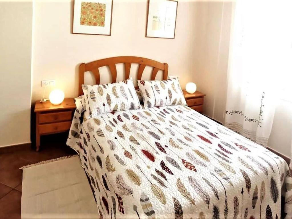 A bed or beds in a room at House in paradisiacal beach area La Isleta, Níjar