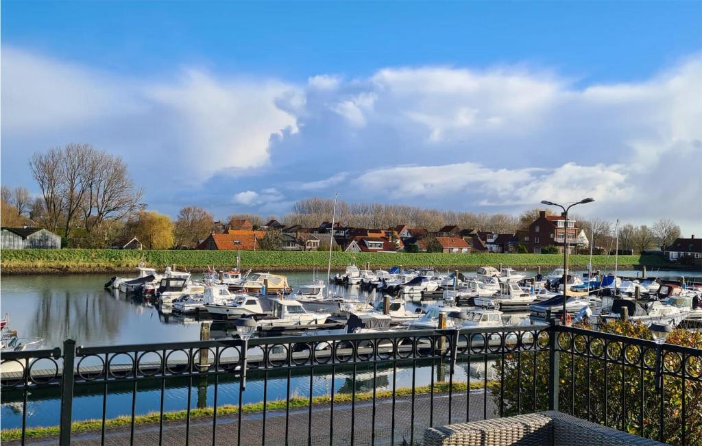 a bunch of boats are docked in a marina at Amazing Home In Stavenisse With Sauna in Stavenisse