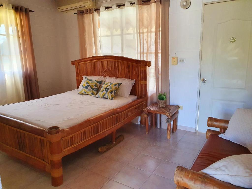 Postel nebo postele na pokoji v ubytování Caribe Aparthotel 1C