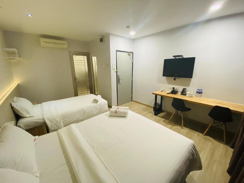 TV a/nebo společenská místnost v ubytování Hotel U and Me