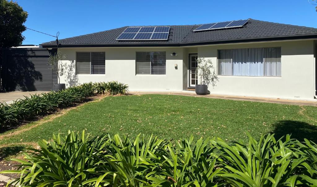 a house with solar panels on the roof at Para House, Tanunda. In the heart of The Barossa Valley!. in Tanunda
