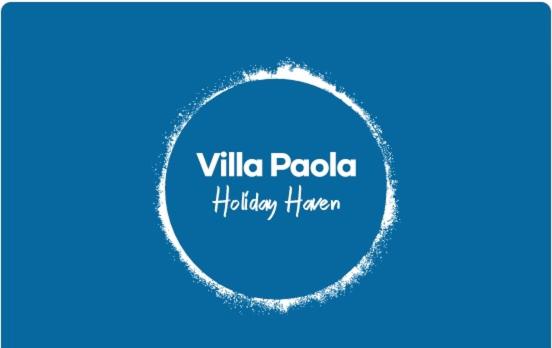 un cerchio blu con il gusto di villa pola per le vacanze di Villa Paola a Capaci
