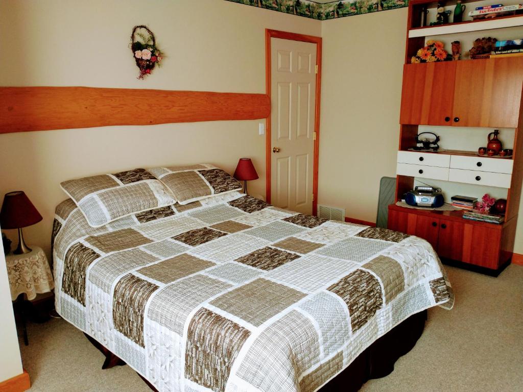 Postel nebo postele na pokoji v ubytování PineWood Guesthouse