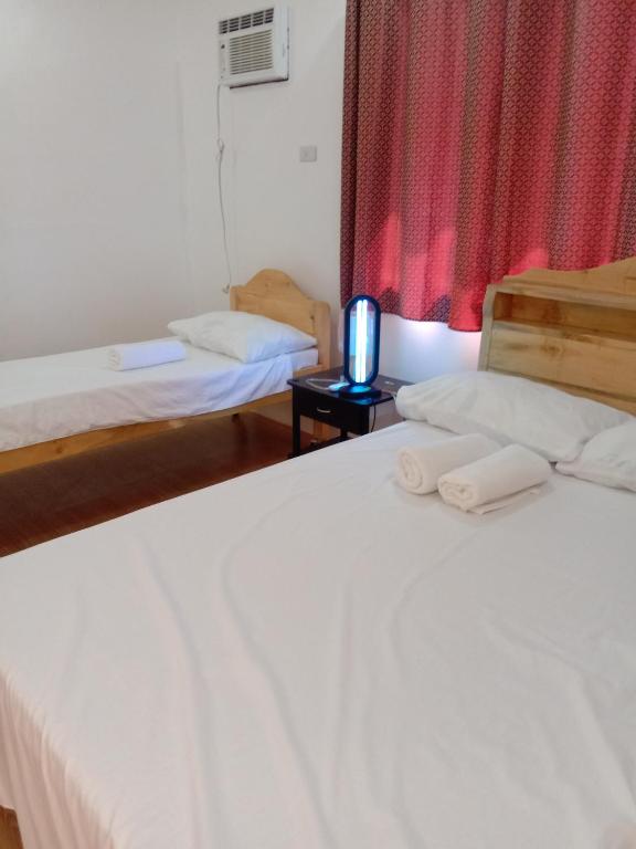 Voodi või voodid majutusasutuse RNA Guesthouse toas