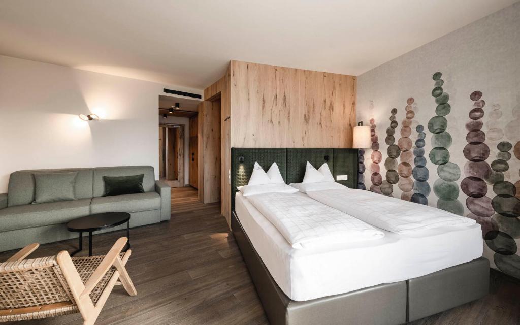 Postel nebo postele na pokoji v ubytování Schenna Resort
