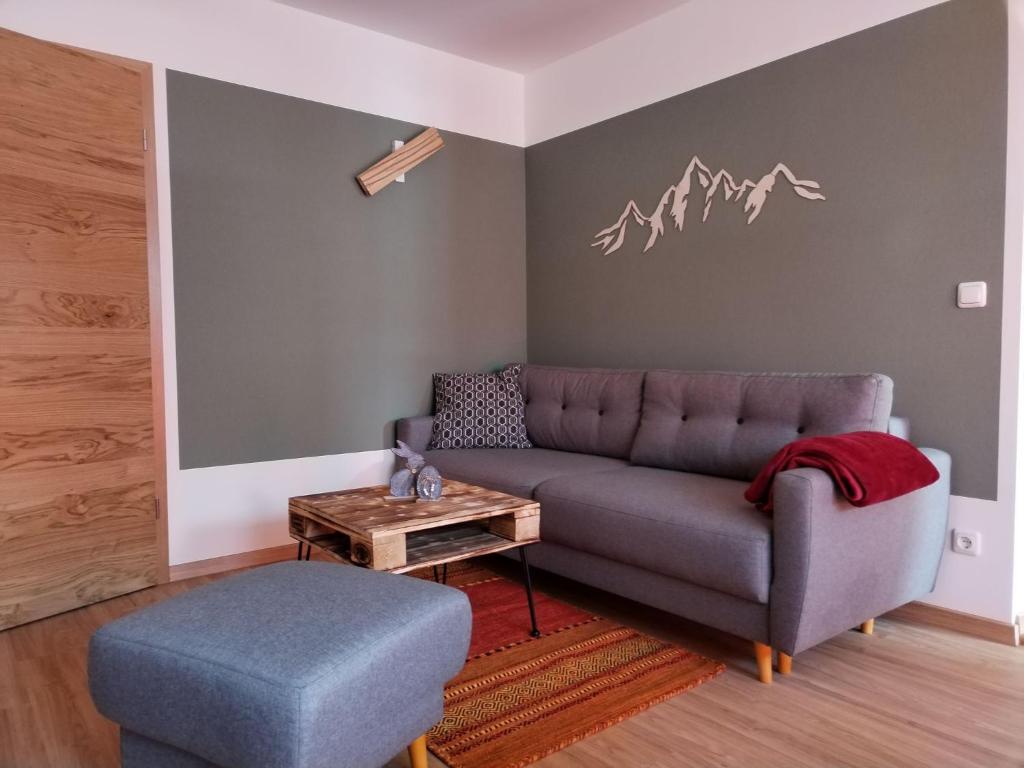 Posezení v ubytování Ferienwohnung am Gänsbach