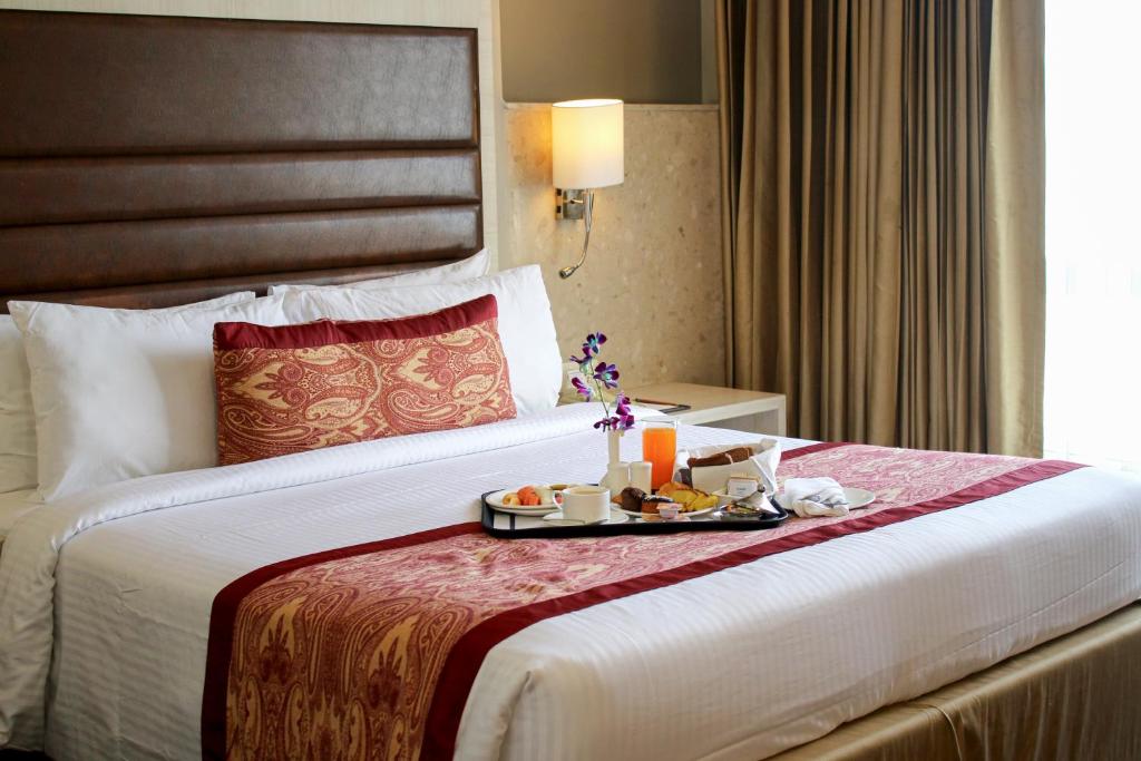 Mahagun Sarovar Portico Suites - 工作室 -  1张双人床