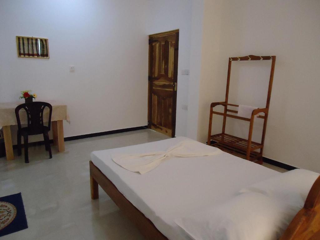 Postel nebo postele na pokoji v ubytování Hotel Glee